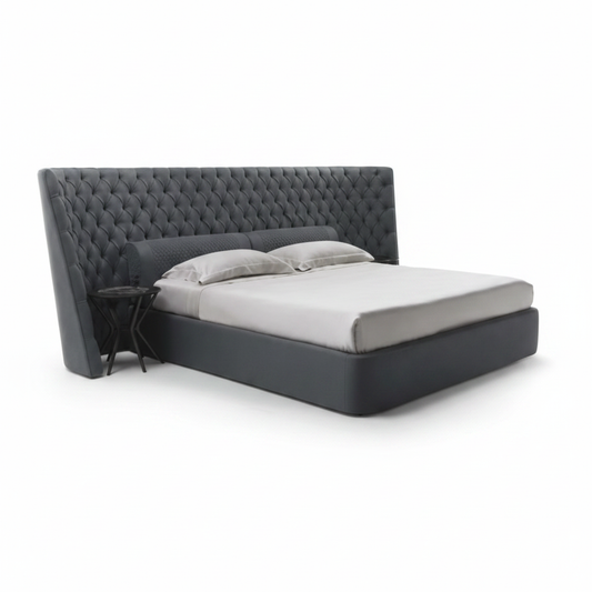 Nocte button-tufted upholstered bed in charcoal grey, side view