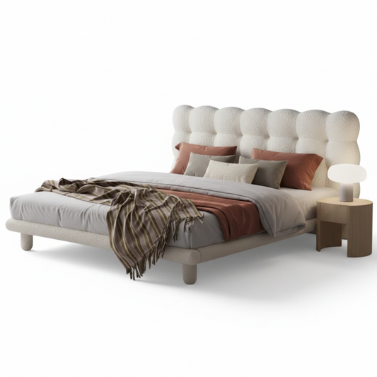 Cumulo bed styled with warm grey bedding and terracotta pillows
