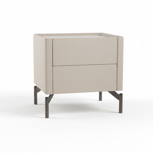 Top view of cream leather upholstered bedside table on dark gunmetal metal legs