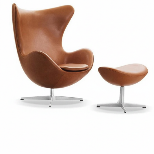 High-back cognac tan leather egg chair with polished aluminium swivel base, front view on white background