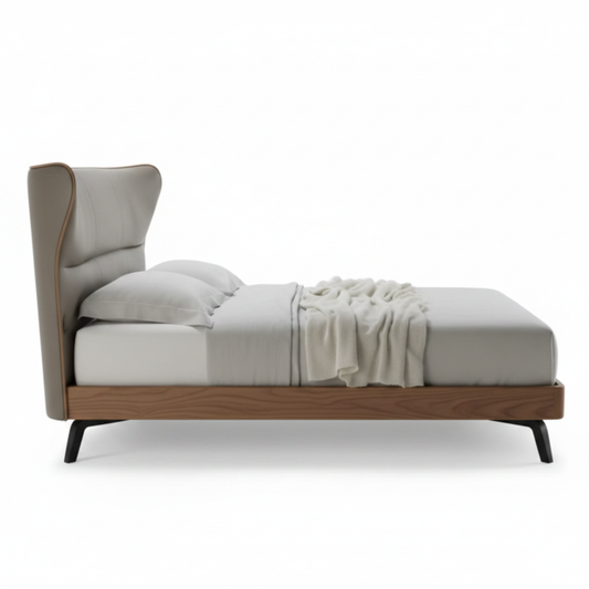 Aldora winged upholstered bed in taupe with walnut base, side view