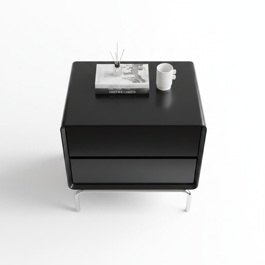 Top view of glossy black handleless bedside table on chrome sled base