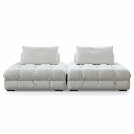 Two-module cream boucle tufted modular sofa front view on white background