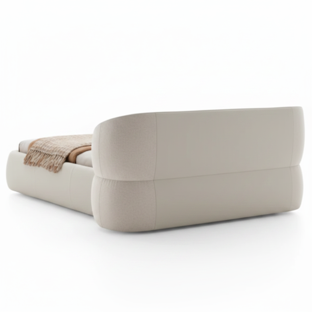 Forma sculptural asymmetric upholstered bed in cream, back view