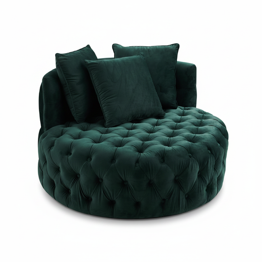 Oversized round button-tufted emerald green velvet loveseat chair with scatter cushions on white background
