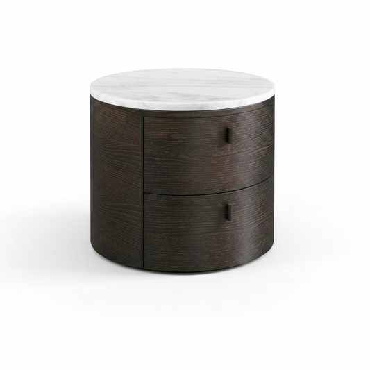 Round drum dark espresso wood bedside table with white marble top and two curved drawers, front view on white background