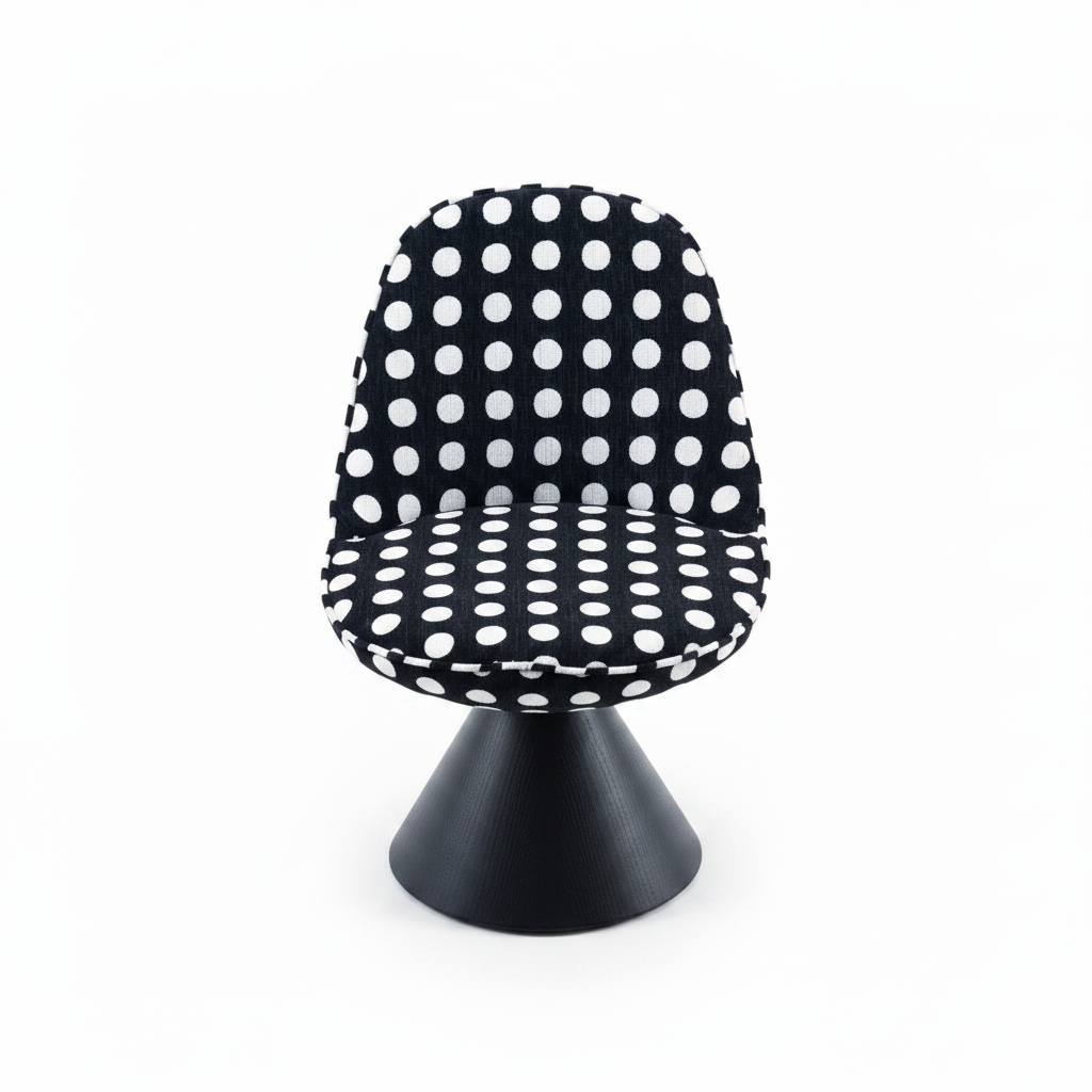 Front-facing studio shot of the Pois Accent Chair with black and white polka dot upholstery and black cone base