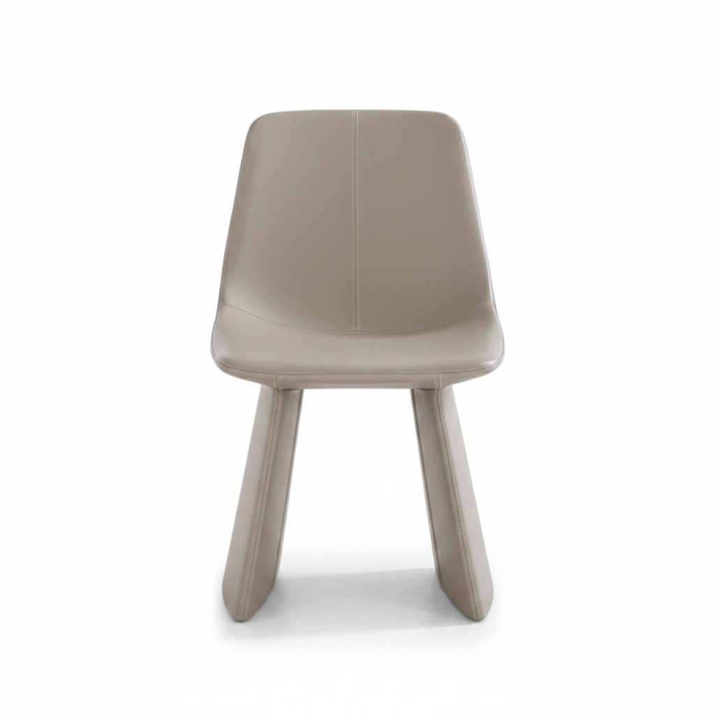 Front-facing studio shot of the Lama Leather Dining Chair in greige with sculptural blade legs