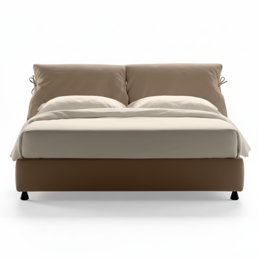 Fiocco bow-tie cushion upholstered bed in warm mocha, side view