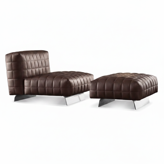 Dark chocolate brown grid-tufted leather armless lounge chair with matching square ottoman on polished chrome sled bases on white background