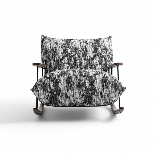 Modern rocking lounge chair in black and white abstract fabric with dark walnut curved base on white background