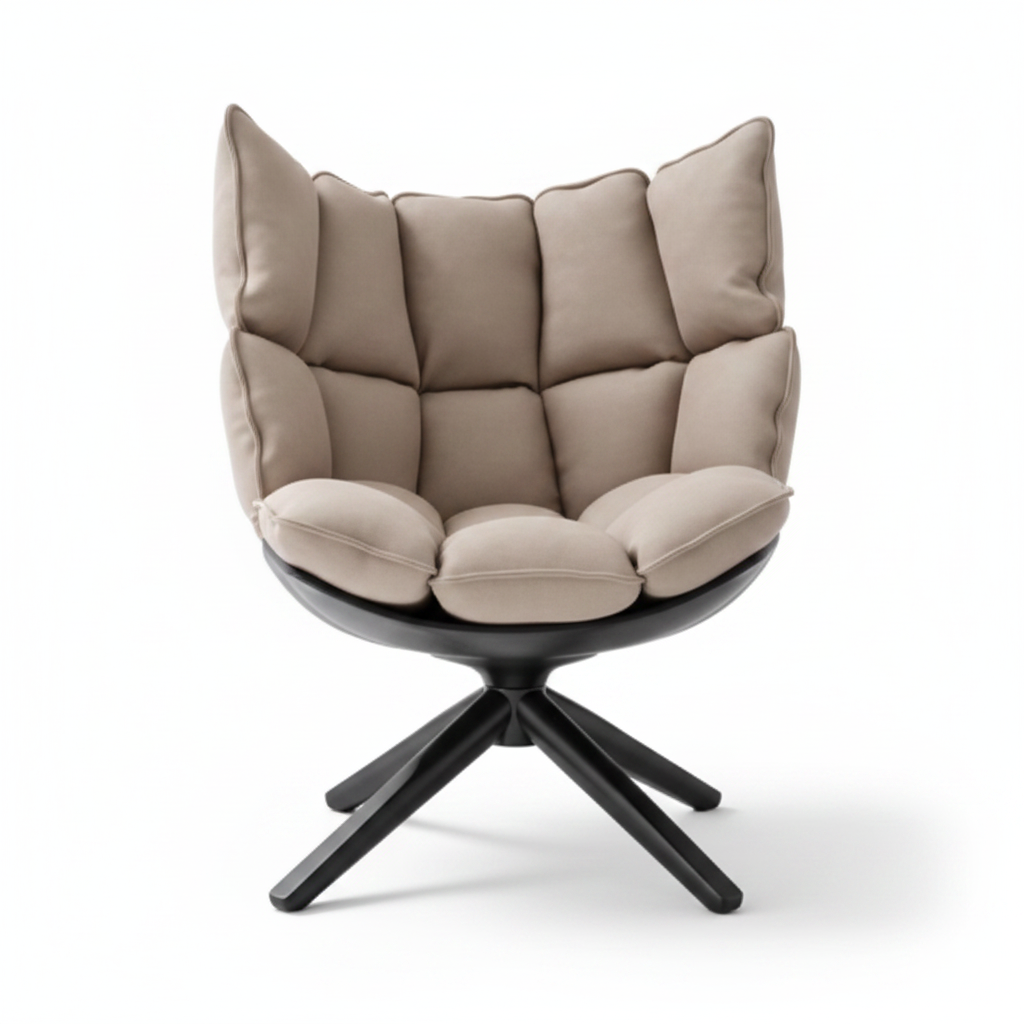 High-back grid-quilted lounge chair in warm sand fabric with matte black shell and 4-star splayed base on white background