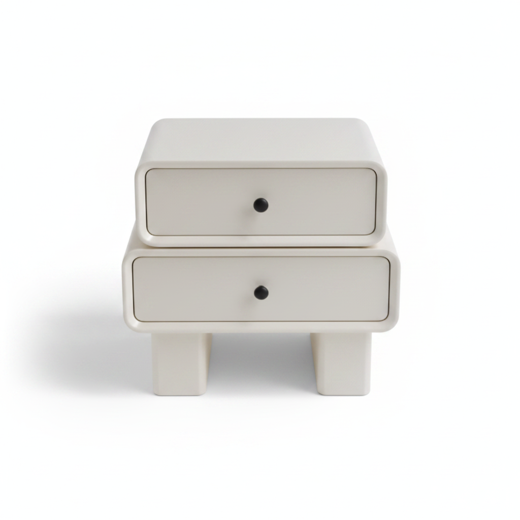 Top view of warm cream matte bedside table with black knob handles on chunky legs