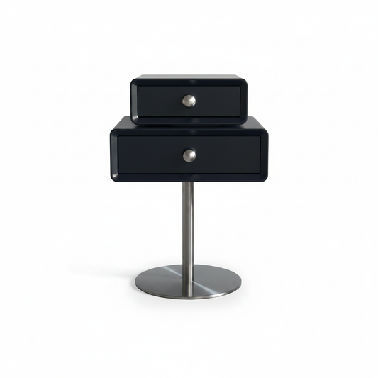 Glossy black two-drawer side table on polished chrome pedestal base, front view on white background