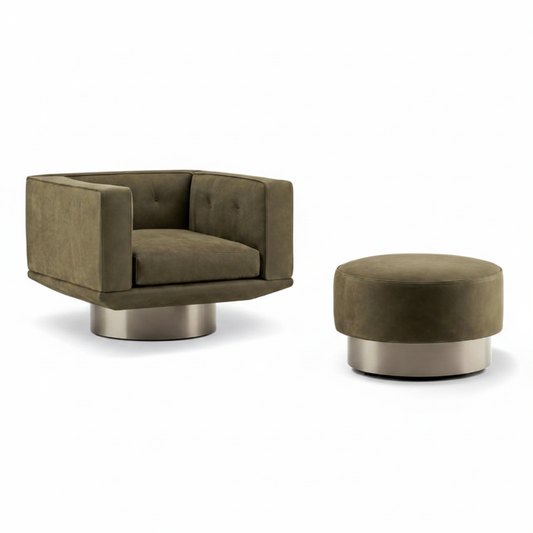 Square cube olive green leather swivel lounge chair with grid tufting and matching round ottoman on brushed gunmetal drum bases on white background