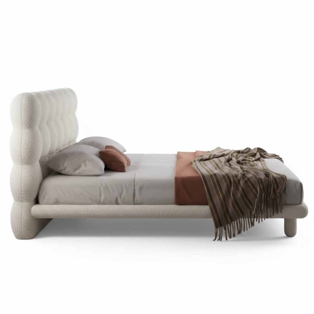 Cumulo cloud-tufted bouclé bed in cream, side view