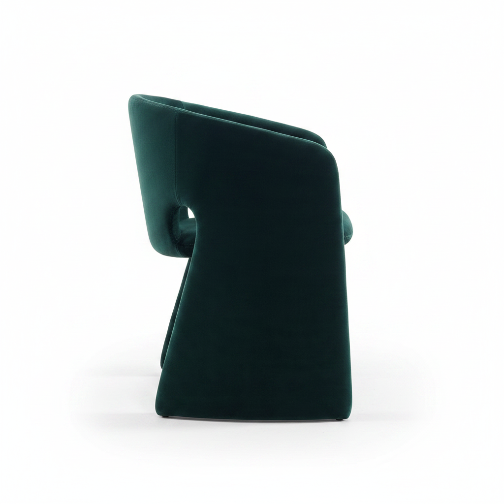 Side profile view of the Grotto Velvet Barrel Dining Chair showing the barrel shell and flared base silhouette