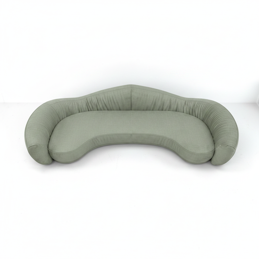 Vellara curved bouclé sofa in sage green, top view