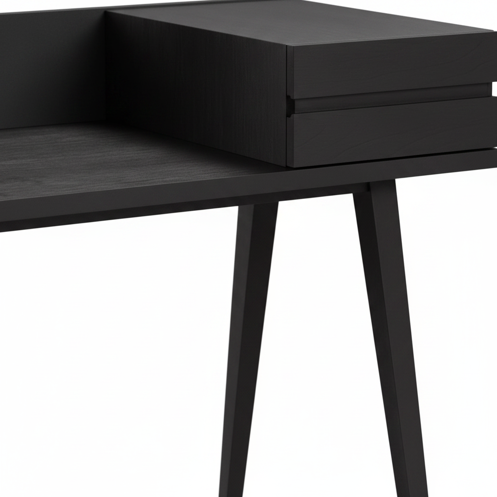 Close-up of black wood grain, drawer detail and tapered leg junction