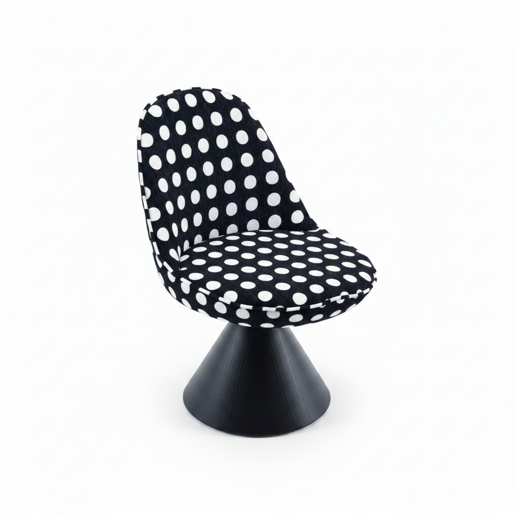Three-quarter angled view of the Pois Accent Chair showing the polka dot shell and cone base
