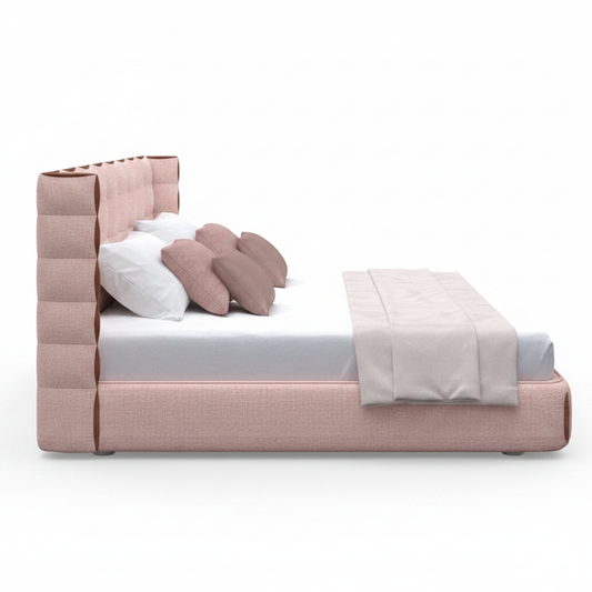 Aurore king bed — side profile showing tall headboard and chunky base