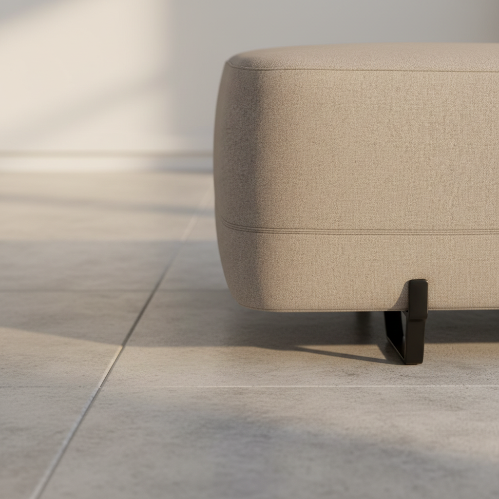 Close-up of Sero Ottoman fabric texture and matte black leg detail