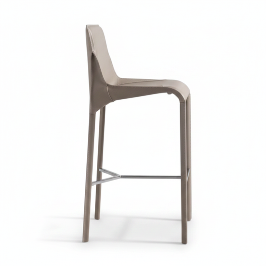 Side view of fully leather-wrapped taupe bar stool showing organic cutout detail