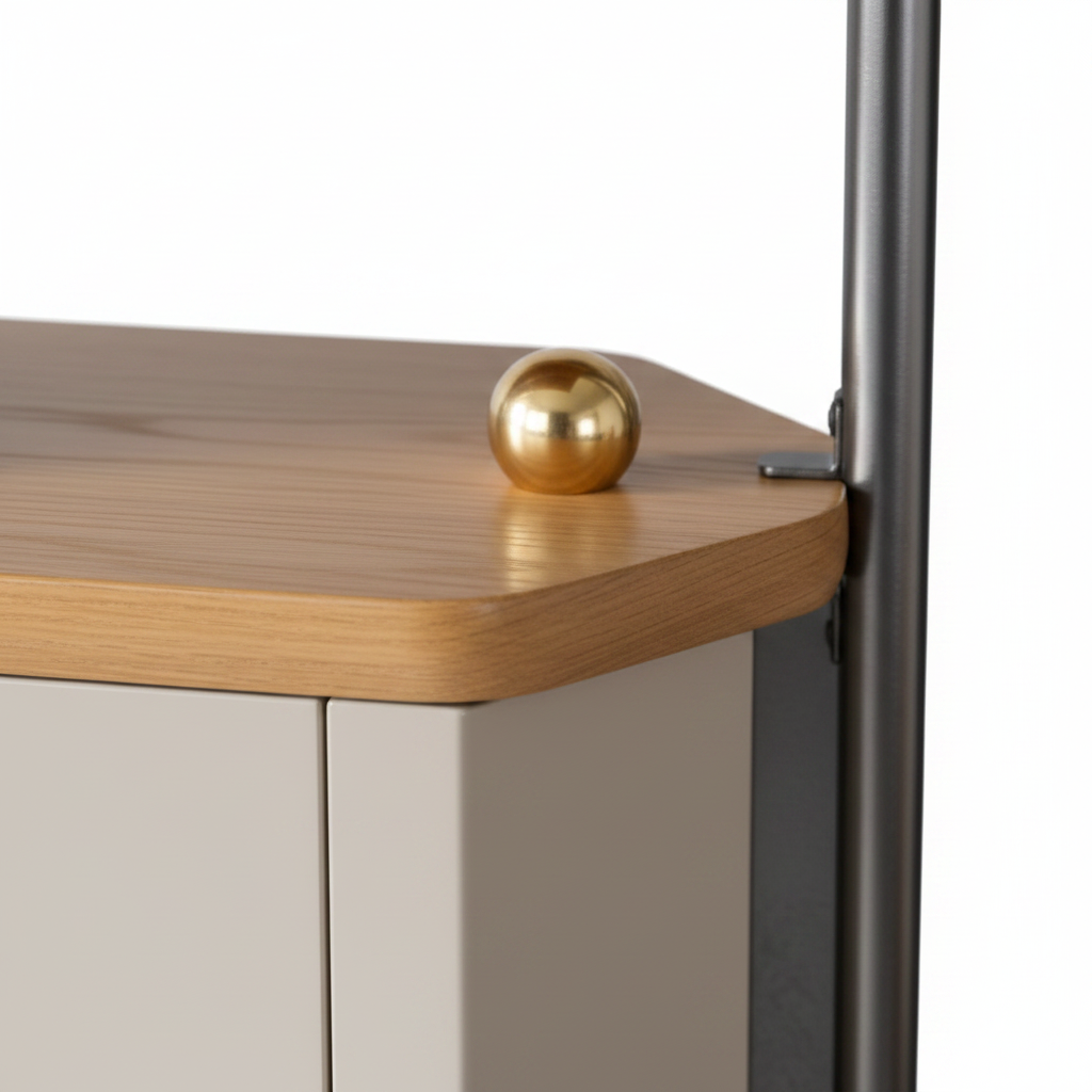 Auris Pole Shelving System close-up of brass finial cap, oak shelf edge and cream cabinet corner