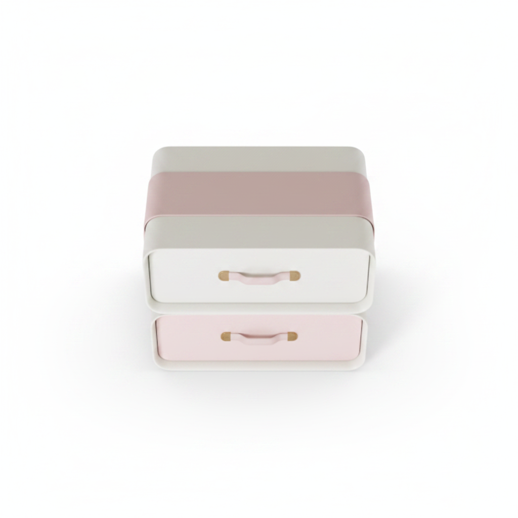 Top view of cream matte stepped bedside table with blush pink drawer fronts