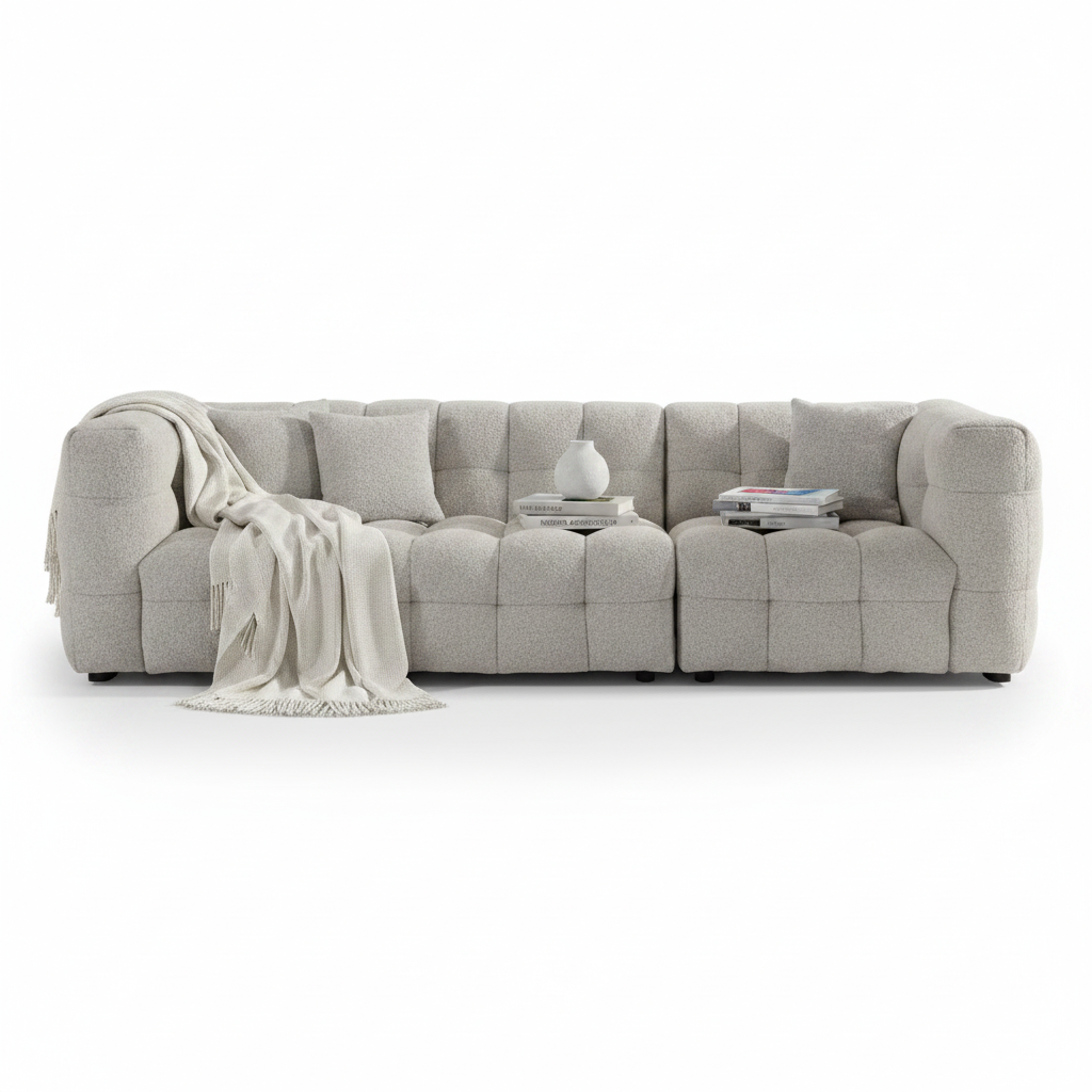 Alveo Sofa styled with throw, books and ceramic vase
