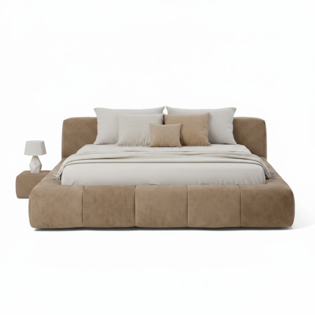 Bruma bed styled with white linen bedding and decorative pillows