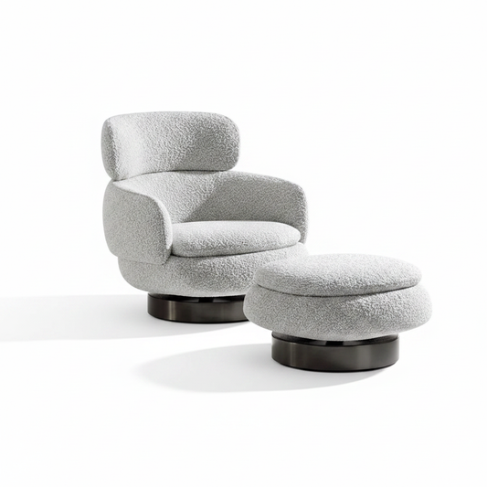 High-back tiered grey boucle swivel lounge chair with matching round ottoman on dark disc bases on white background